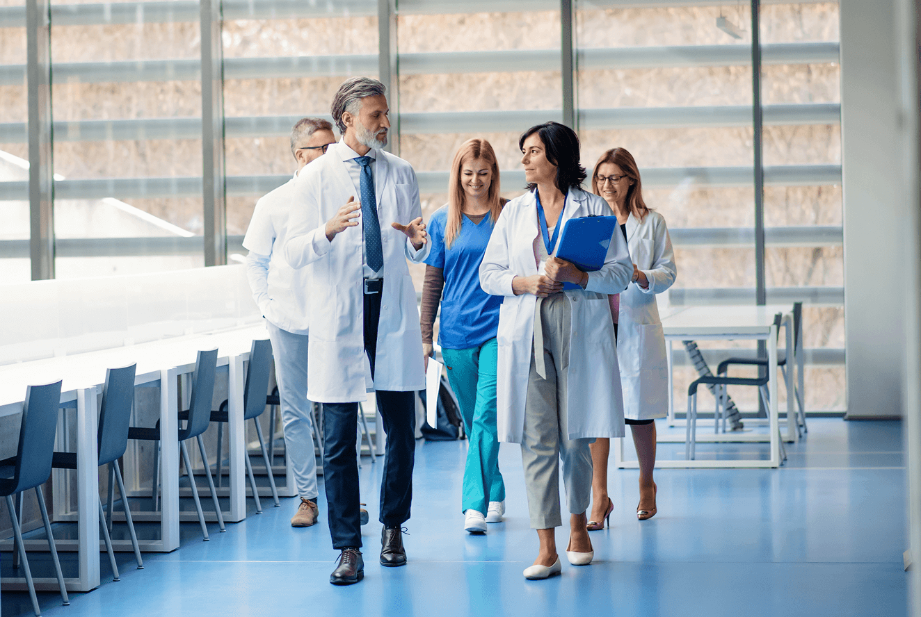 Medical professionals walking in hallway