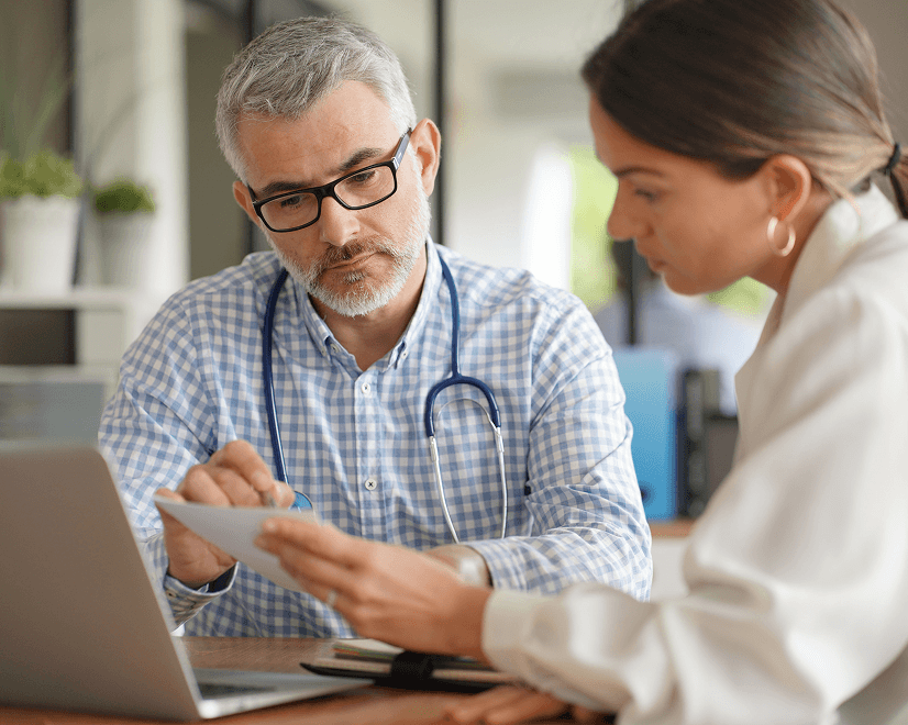 Doctor consulting with a patient.
