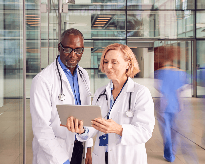 Two doctors reviewing information together