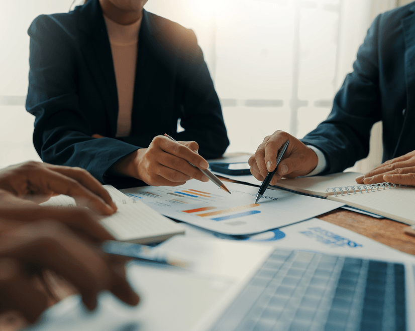 Business meeting with charts and discussion